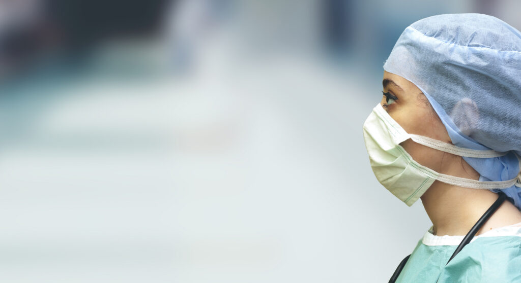 Side  woman doctor wearing medical surgical mask, cap and virus