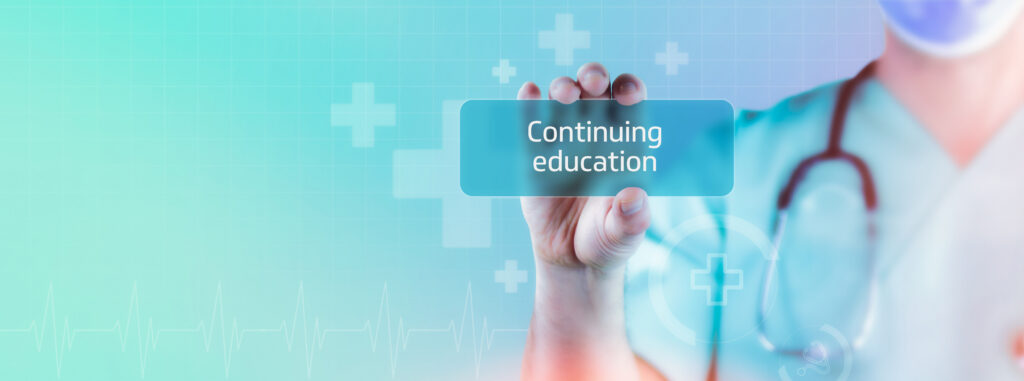 Continuing education. Doctor holds virtual card in hand. Medicin
